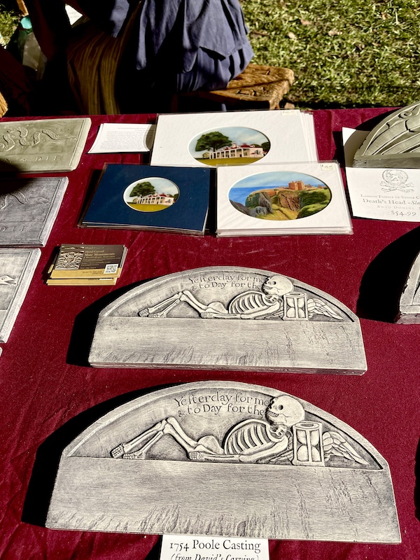 Two half circles of stone cut skeletons at the Hagood Mill Native American Celebration