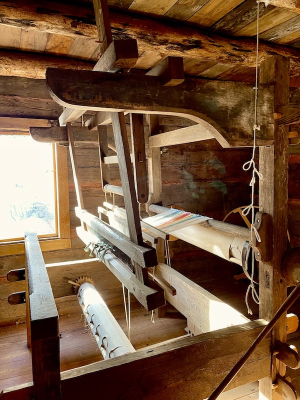 Large wood loom making white cloth at Hagood Mill Native American Celebration