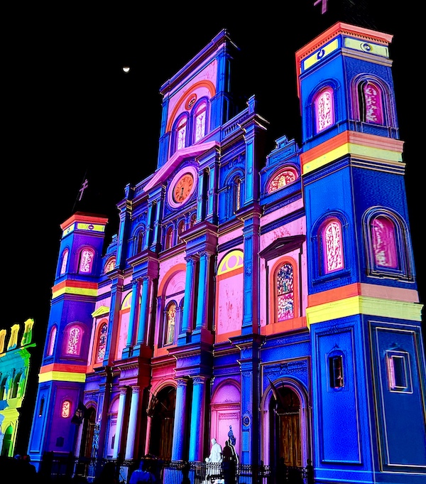St. Louis Cathedral transformed from white to deep blue and pink for Celebrating Super Bowl NOLA Style