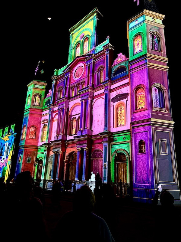 Multicolor transformation of a white church for Celebrating Super Bowl NOLA Style