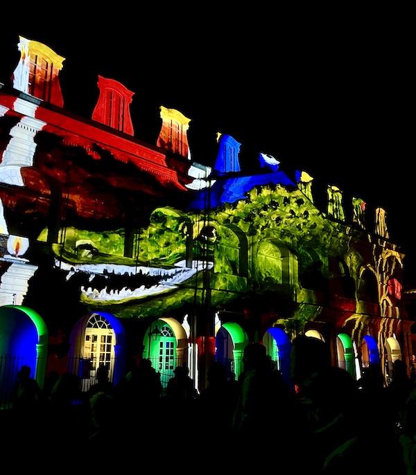 Green alligator projected on church for Celebrating Super Bowl NOLA Style