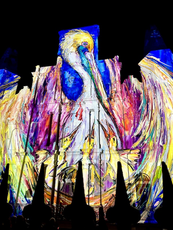 Pastel colored pelican project on church facade