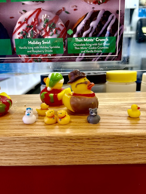 A variety of rubber duckies on the counter at Duck Donuts visited while on our South Carolina College Tour