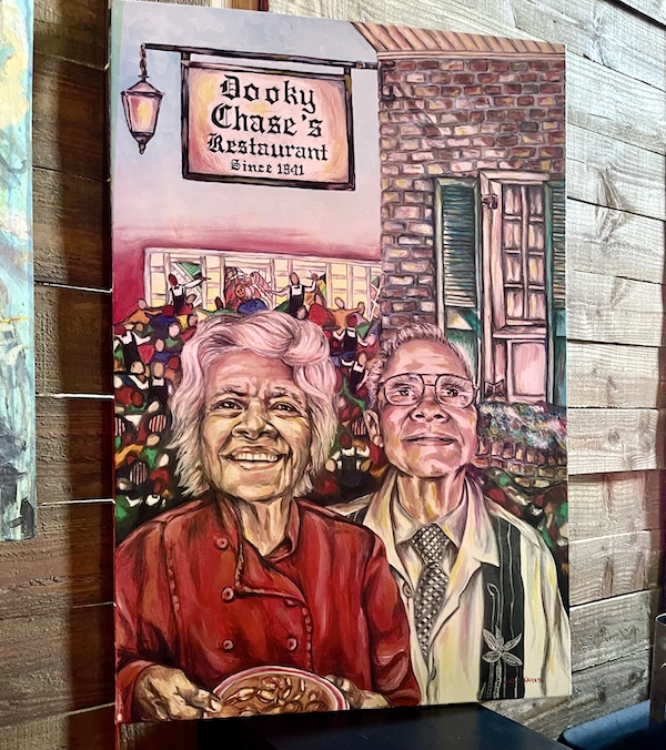Portrait of restauranteurs Leah and Dooky Chase Jr. in front of their restaurant Dooky Chase at Family Style FoodFest NOLA