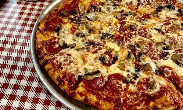 Whole pizza on the table at a restaurant in Hill Country's Wimberley Texas
