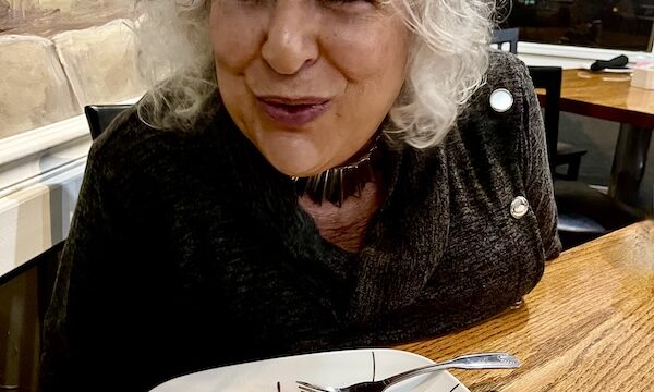 Me blowing out the birthday candle of my cheesecake at Italian Garden Restaurant Canyon Lake TX