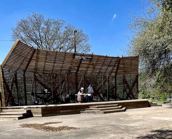 Pavilion with people reading from the torah at Landa Park New Braunfels TX