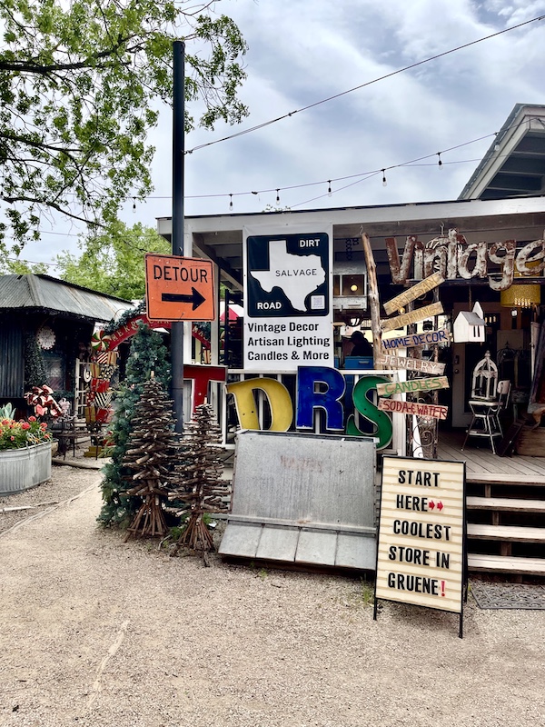 Small shop with Texas shaped sign outside in New Braunfels and Gruene Texas