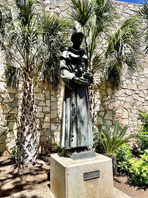 Bronze sculpture of San Antonio stands along the San Antonio River Walk named for him.