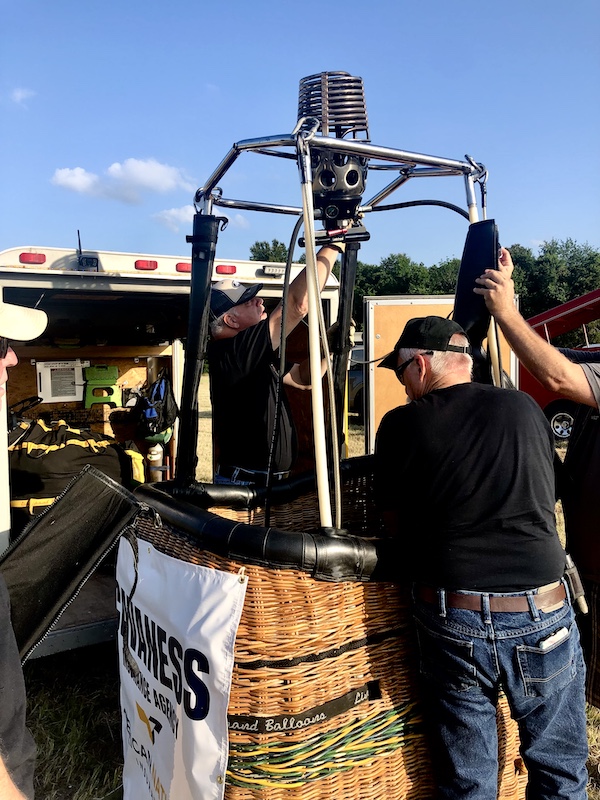 Men setting up a the basket or gondola for a hot air balloon at the Hopkins County Dairy Festival 2025