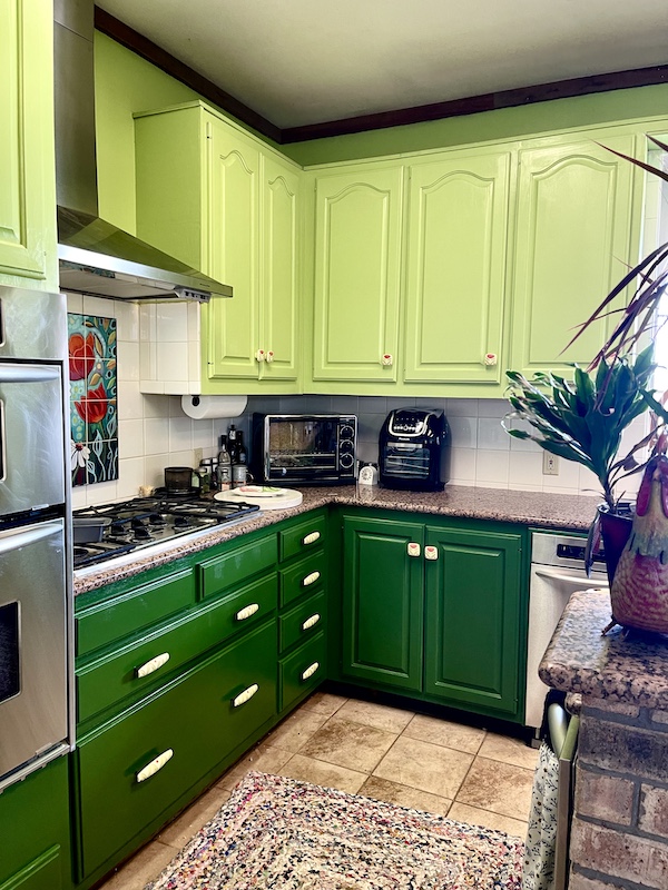 View of Kitchen Transformation in Texas showing hood and stove