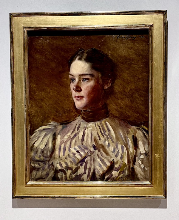 Portrait of a woman wearing a striped dress with puffy sleeves at the Westmoreland Museum of American Art