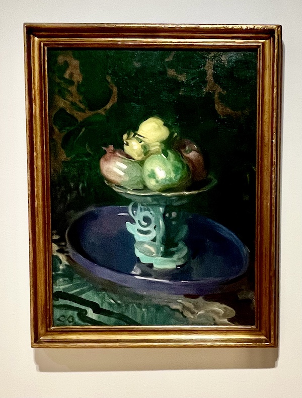 Painting of a green pedestal fruit dish topped with fruit at the Westmoreland Museum of American Art