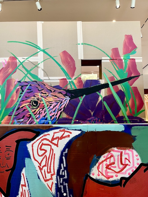 Mural of a hummingbird above the patchwork quilt at Westmoreland Museum of American Art 2