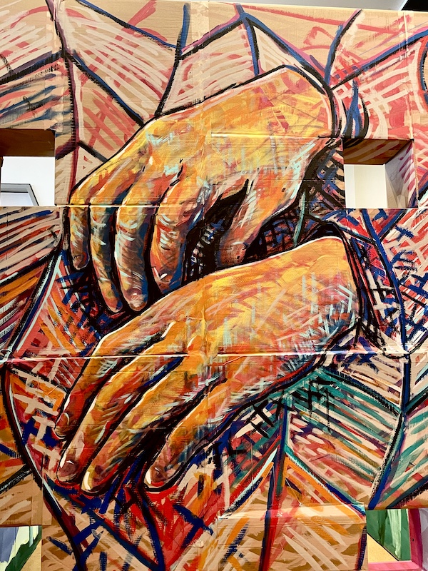 Close up of hands painted on cardboard at the Westmoreland Museum of American Art 2