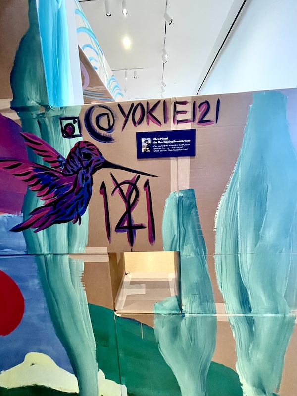 Mural of a bird in flight among colorful tree at the end of the Art Maze at Westmoreland Museum of American Art 2