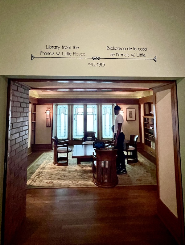 Looking into a home library with table chairs and area rug at Allentown Art Museum