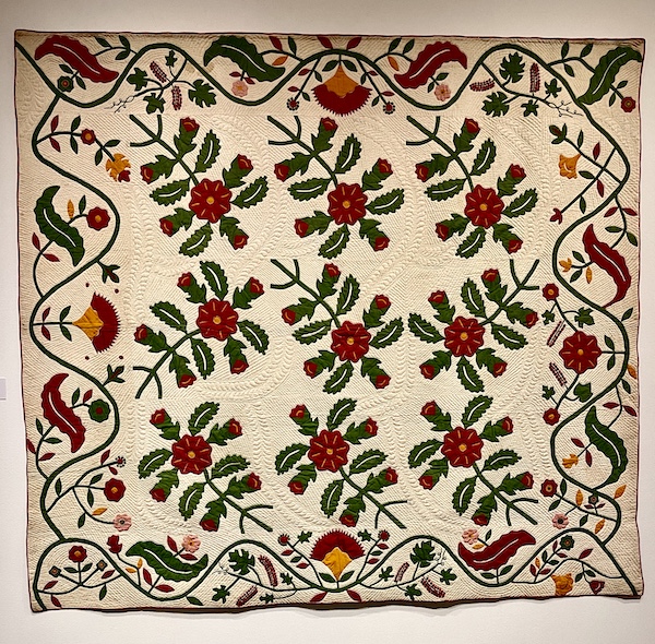 Floral patterns on off-white background quilt at Allentown Art Museum Quilts