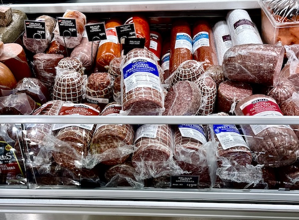 DeLallo Italian Marketplace refrigerator case of assorted salamis