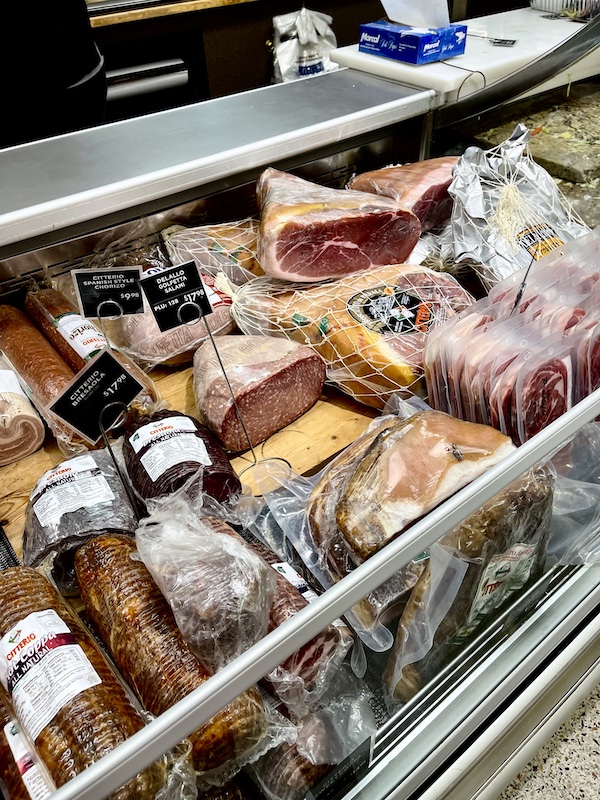 DeLallo Italian Marketplace refrigerator display case fulled with Italian deli meats