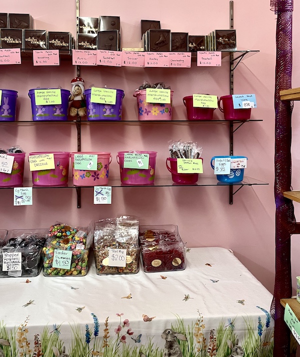 Wall shells with colorful buckets filled with candies on display at Wilson Candies Jeannette PA