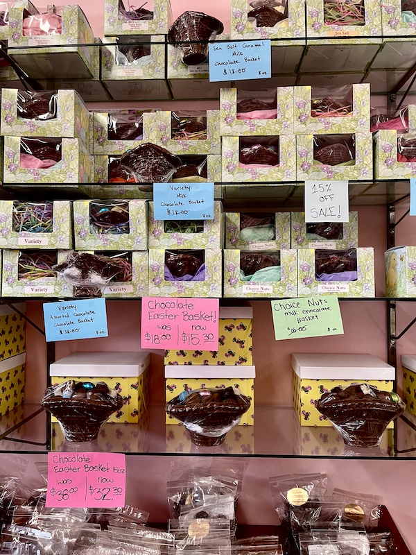 Wall display of boxes of Easter chocolates at reduced prices at Wilson Candies Jeannette PA