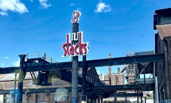 Remnants of an old steel factory and sign welcoming you to the Bethlehem Steel Stacks