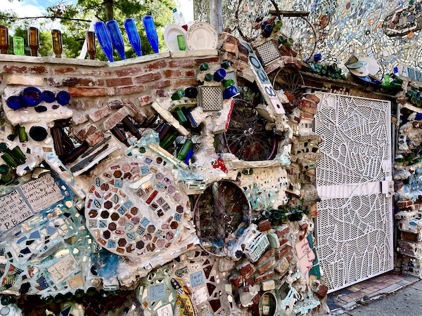 Huge mosaic that covers entire building wall and privacy wall, with ceramic and mirror tiles is the largest of its kind to date. Part of my Murals Around Philadelphia collection
