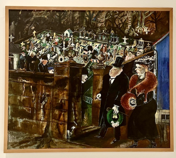 A wealthy couple at the cemetery gate of a somber village graveyard at the WW2 Museum Degenerative Art exhibit