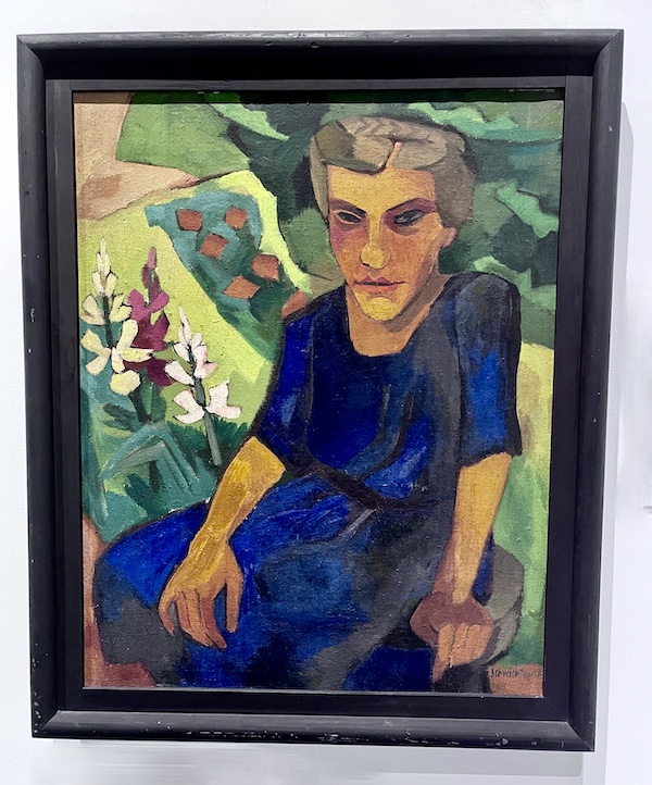 Painting of a woman with light brown hair and a blue dress seated in a garden at the WW2 Museum Degenerative Art exhibit
