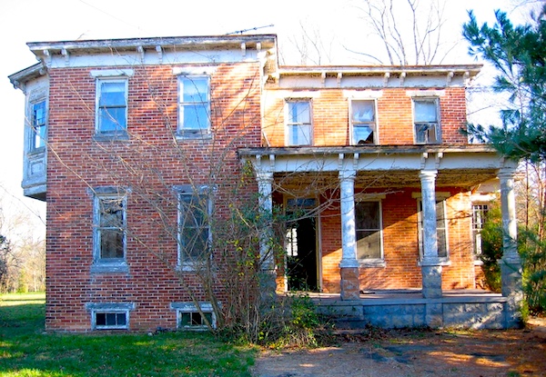 Red brick house with front porch and white columns at Alliance Colony Pittsgrove NJ