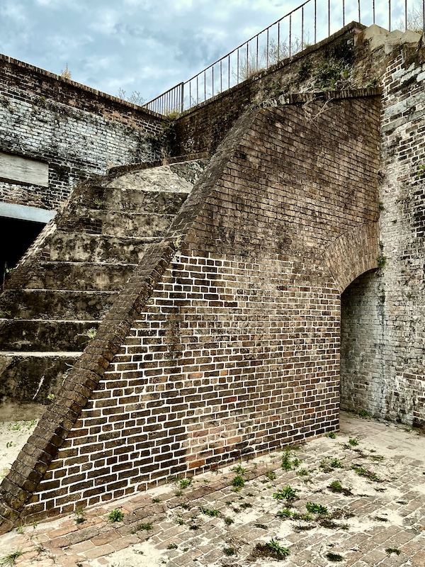 Old brick steps lead to the cannons atop the fortress at Fort Pickens Pensacola Florida