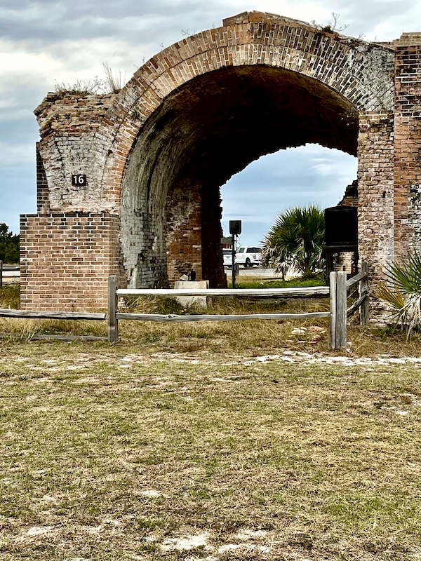 Enormous brick arch with the number 16 on it at Fort Pickens Pensacola Florida
