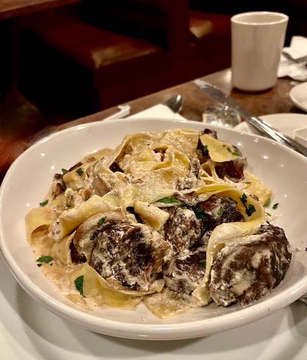 White pasta bowl filled with wide pasta noodles and short rib sauce was part of our October Fun at Jersey Shore