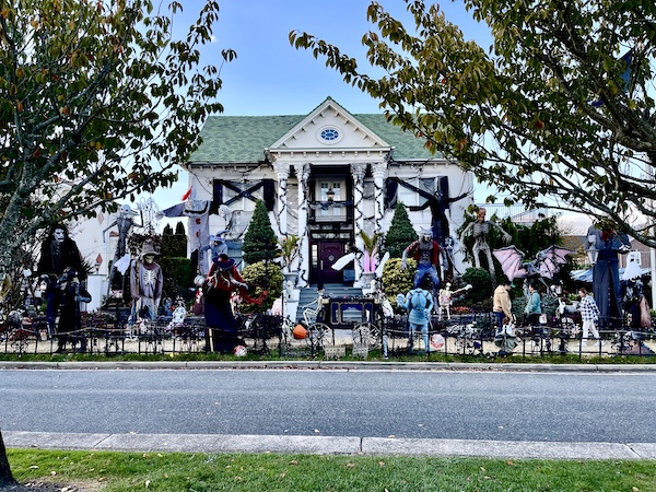 Large white house with many, many halloween decorations in front was part of our October Fun at Jersey Shore