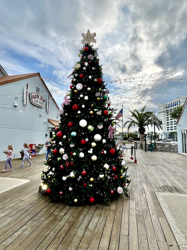 Fully decorated Christmas tree on the Pensacola Boardwalk