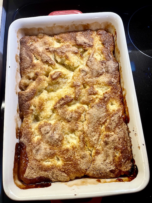 Rectangular baking dish filled with baked apple cobbler for our dessert on Thanksgiving in March?.