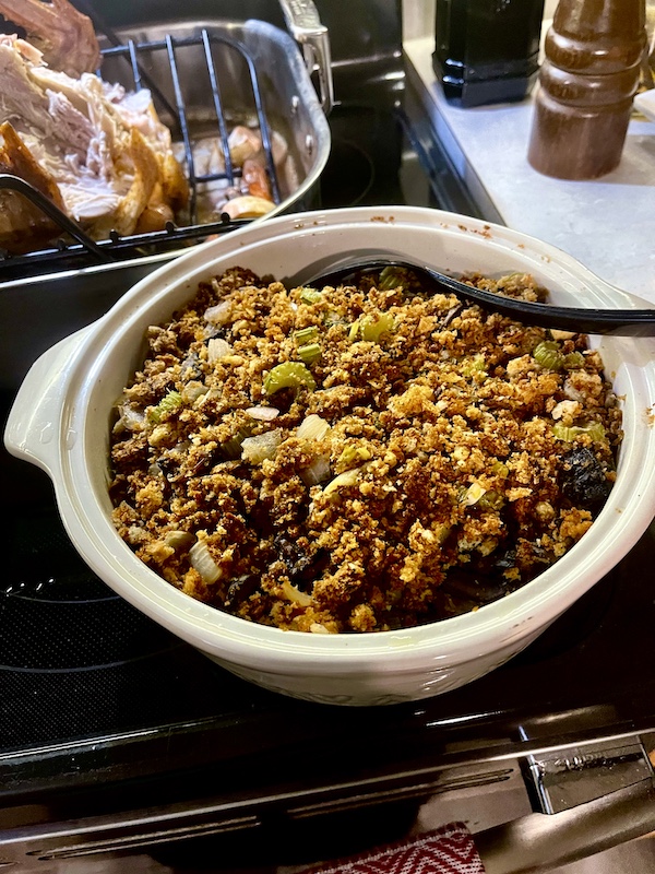 Round casserole dish filled with mushroom stuffing for our Thanksgiving in March?