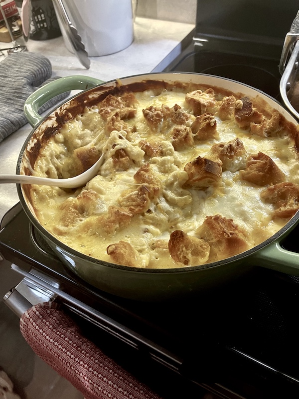 Round casserole dish filled with macaroni and cheese topped with toasted croutons for our Thanksgiving in March?