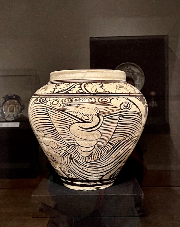 Cream and brown stoneware vase on display at the New Orleans Museum of Art