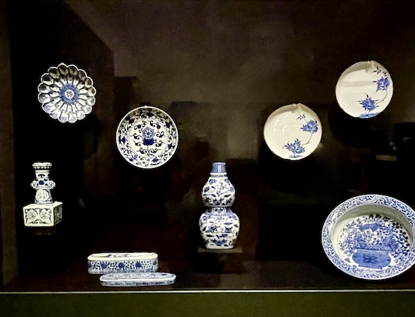 Display case with an assortment of blue and white porcelain objects at the New Orleans Museum of Art