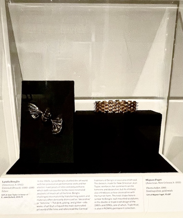 Gold choker necklace with spikes sitting on a black display cube at the New Orleans Museum of Art Part 2