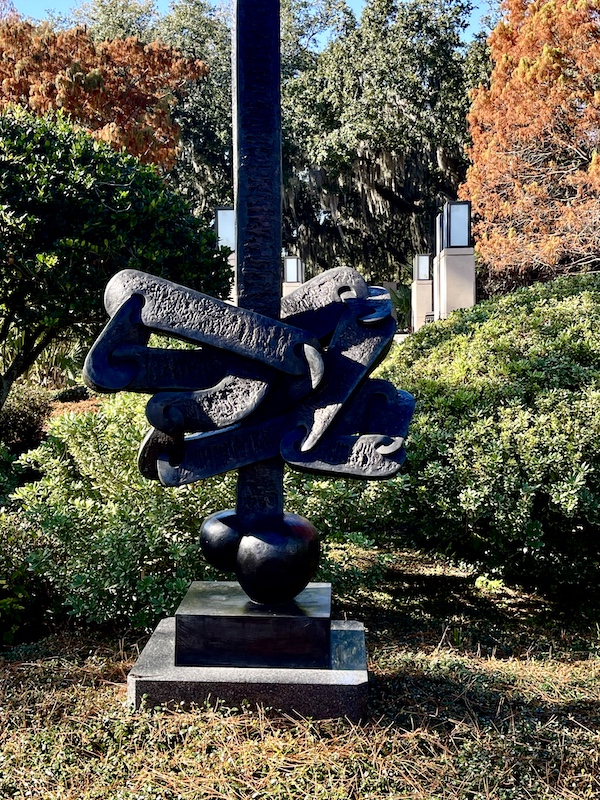 Stylized bronze sculpture on the lawn seen while Sharing Sculpture Garden with Friends