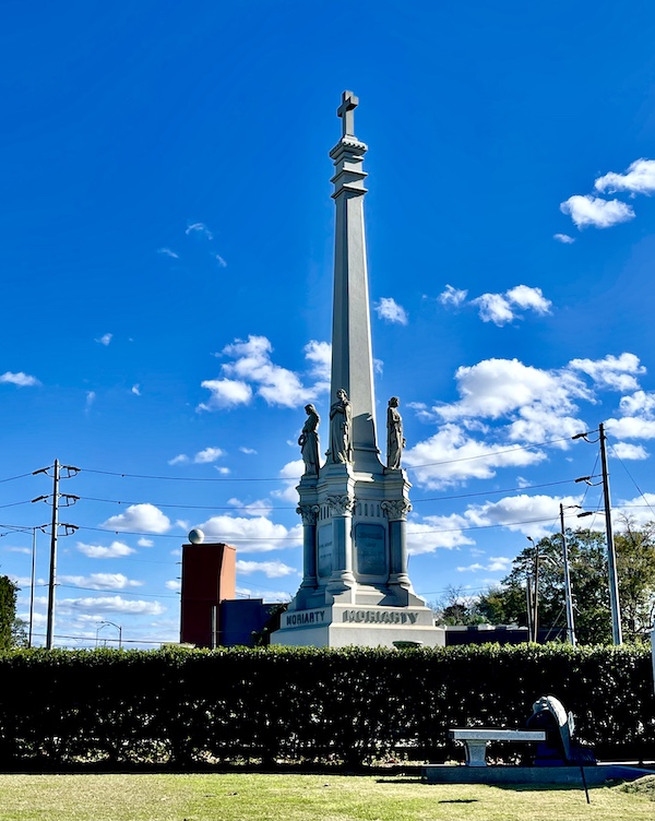 Sky high monument looks over the Historic Metairie Cemetery Louisiana