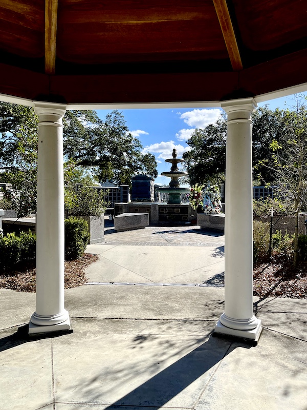 Looking at fountain from under a gazebo at the Historic Metairie Cemetery Louisiana