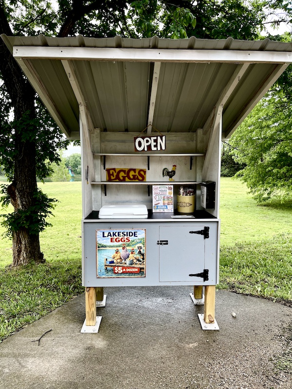Small farm stand where you can purchase eggs.