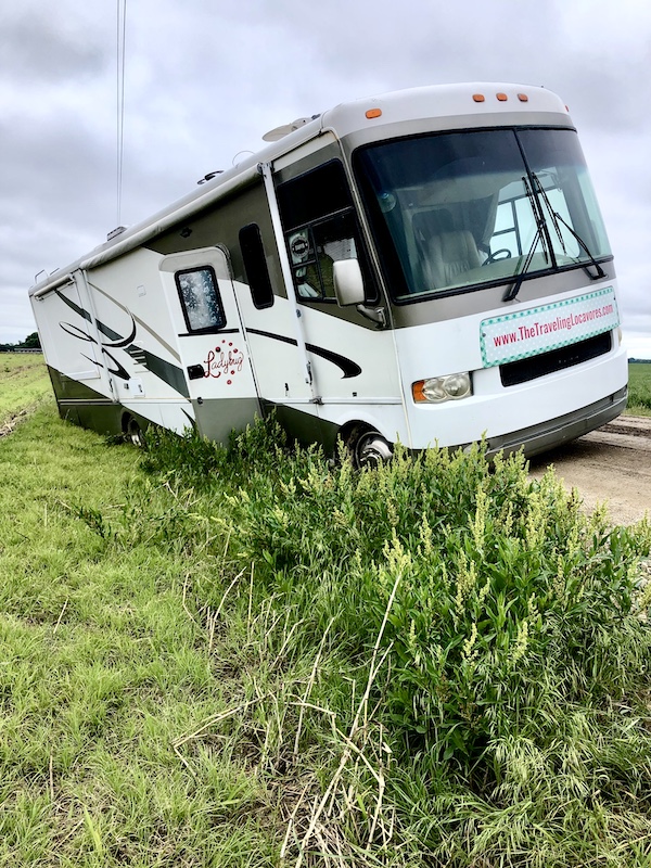 RV on a severe angle in a ditch. Now we're Finally Back on the Road!!!