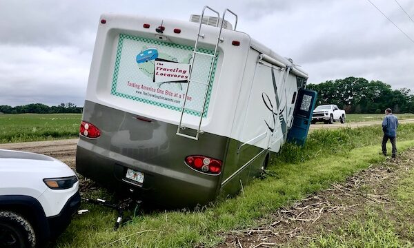 This view shows the RV in the ditch with the Jeep still on the tow bar. Finally Back on the Road!!!
