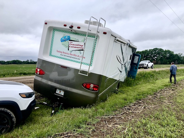 This view shows the RV in the ditch with the Jeep still on the tow bar. Finally Back on the Road!!!