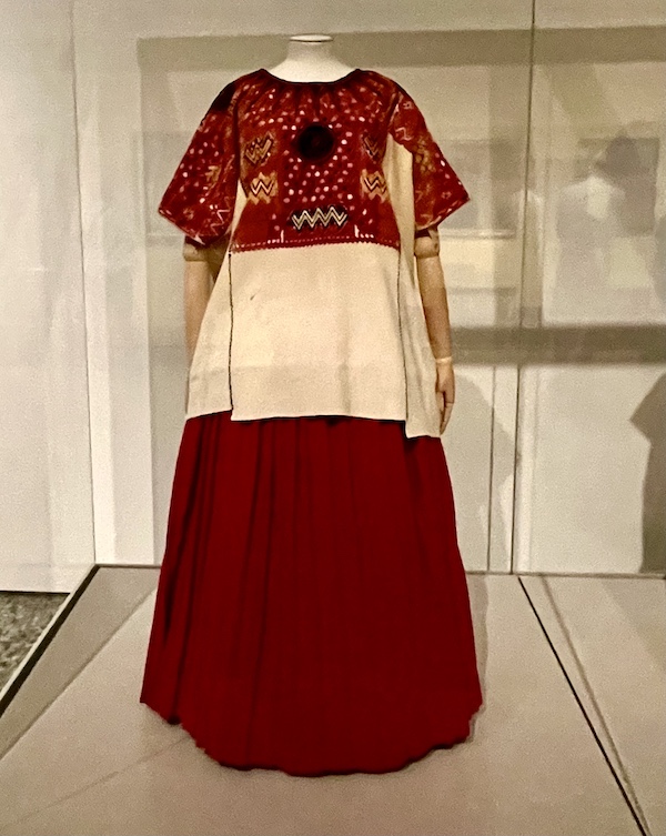 Ceremonial dress in red white and black worn by Frida Kahlo, on display at the Frida Kahlo Exhibit Houston